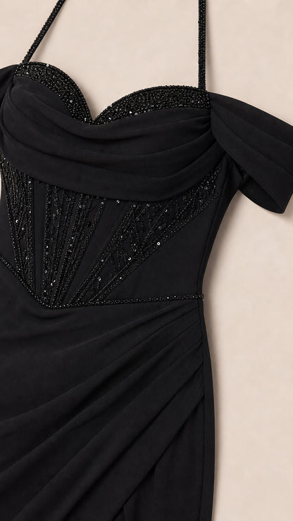 Close-up detail of beaded sweetheart bodice and off-shoulder drape