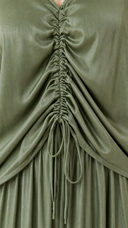 Close-up detail of front drawstring ruching on bodice