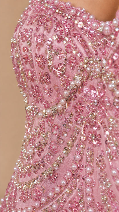 Close-up detail of sequin and pearl embroidery on bodice