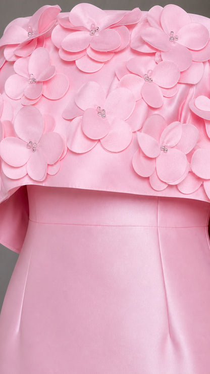 Close-up detail of 3D floral embellishments on the bodice