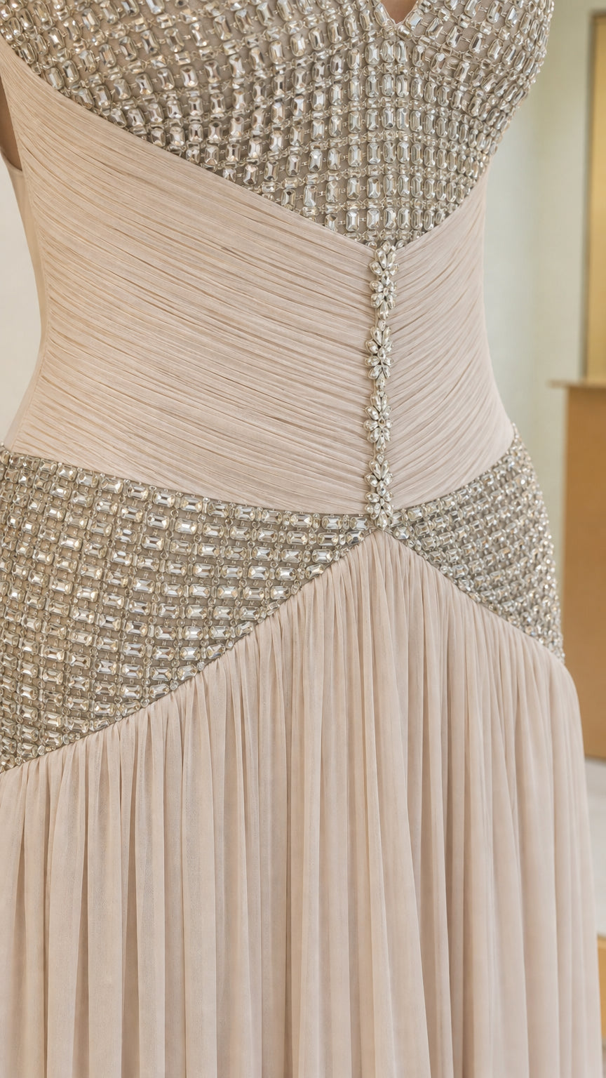 Close-up detail of crystal beaded bodice and button accents