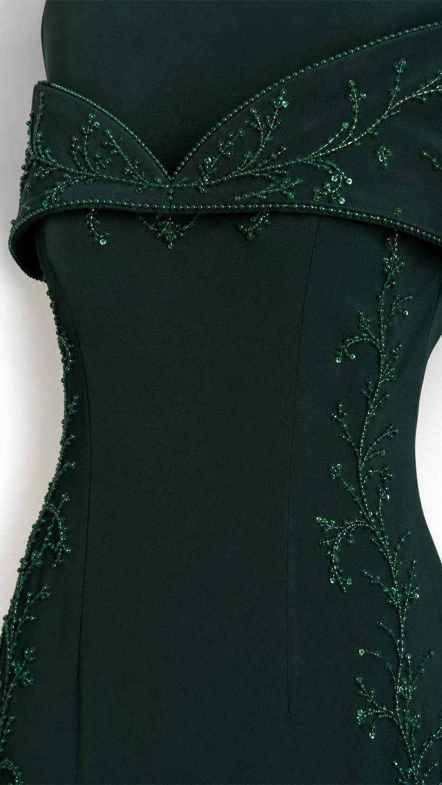 Close-up of beaded vine embroidery on neckline