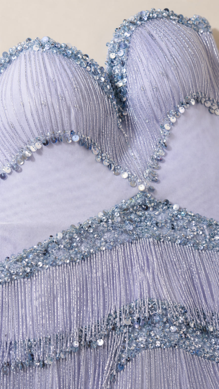 Close-up detail of beaded sweetheart neckline and sequin embellishments
