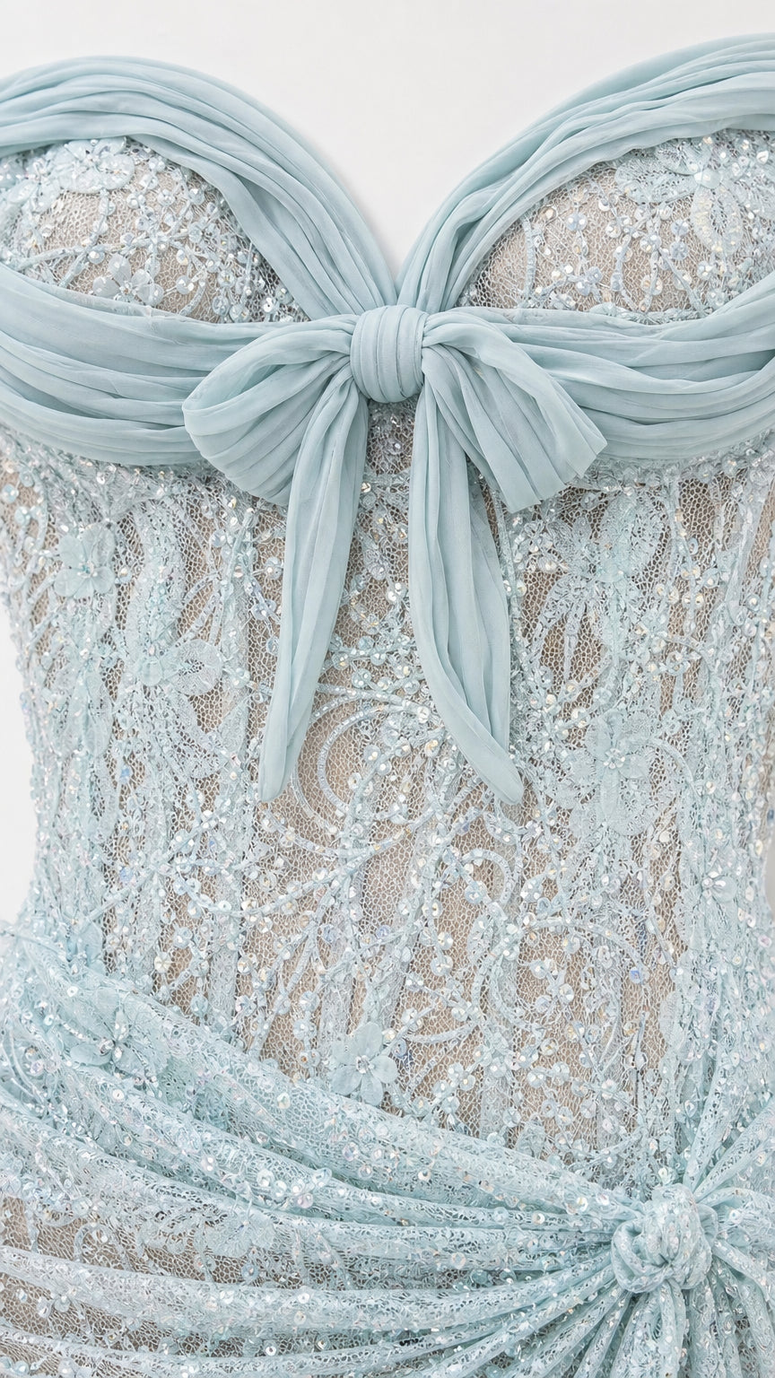 Close-up detail of sweetheart neckline and front bow