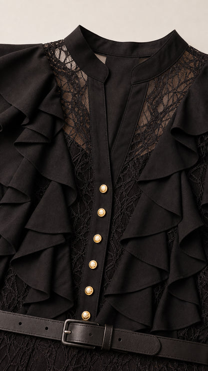 Close up detail of black lace bodice with ruffles, gold buttons, and black belt