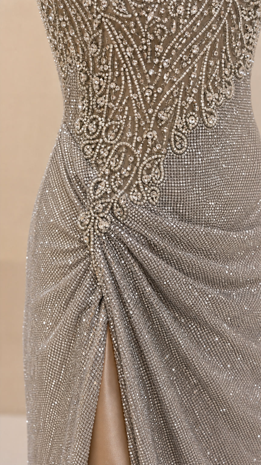 Close-up detail of beaded bodice and side ruching