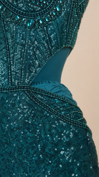 Close-up detail of beaded sweetheart bodice and side waist cutout on Teal sequin dress