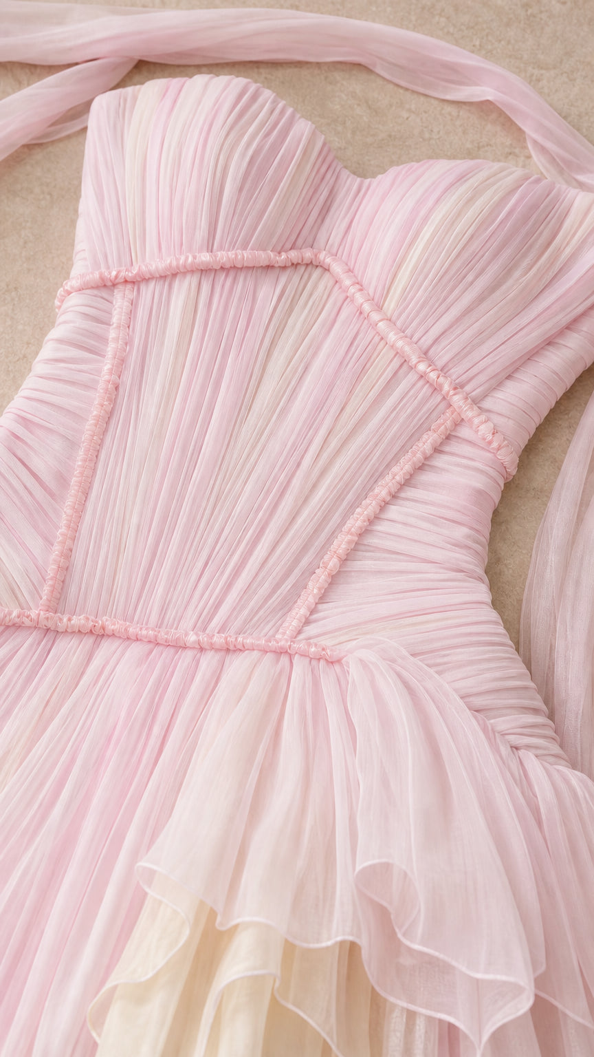 Close-up detail of structured ruched bodice and sweetheart neckline in pink