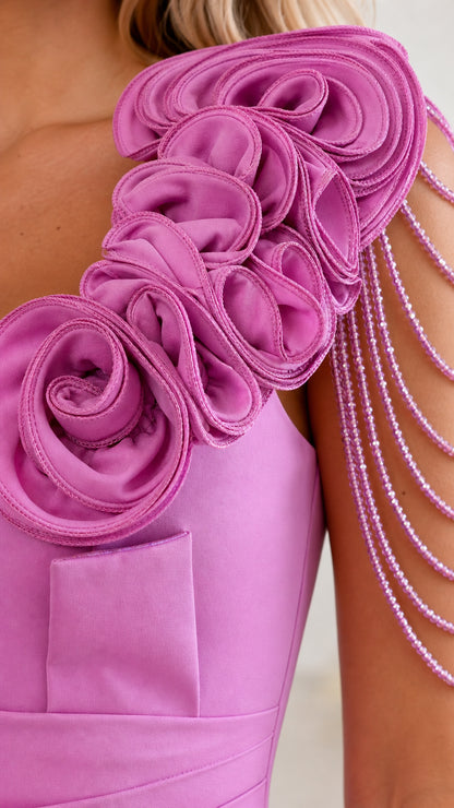 Closeup of shoulder rose appliques and beaded fringe detail