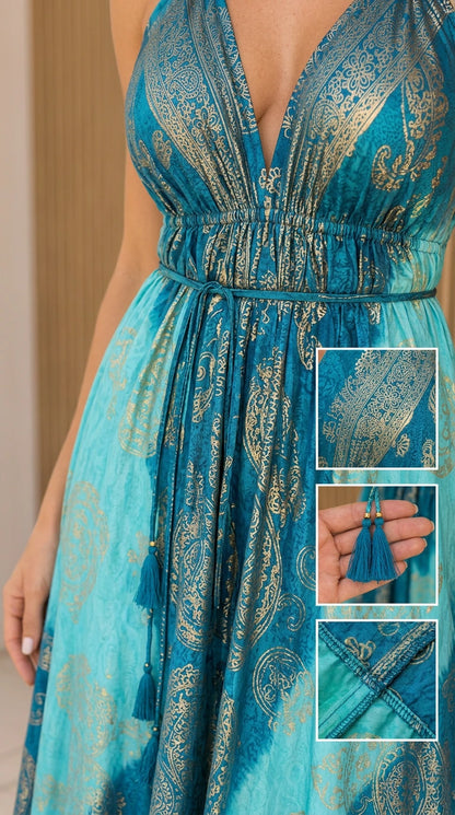 Close-up of fabric, metallic print pattern, and tassel ties