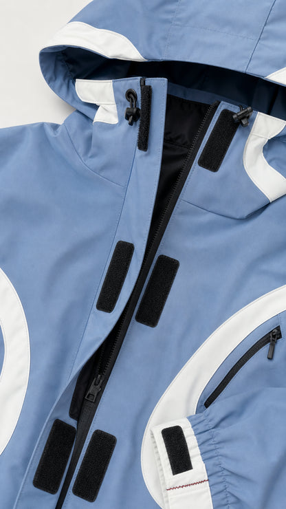 Close-up detail of zipper, hood, and collar construction