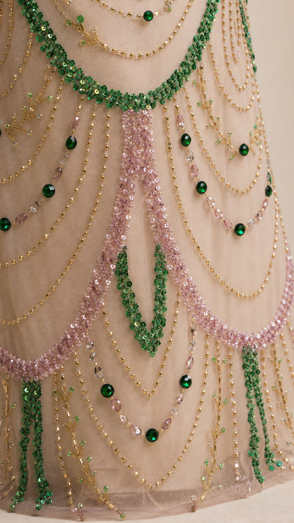 Close-up detail shot of intricate chandelier beadwork and crystal embellishments