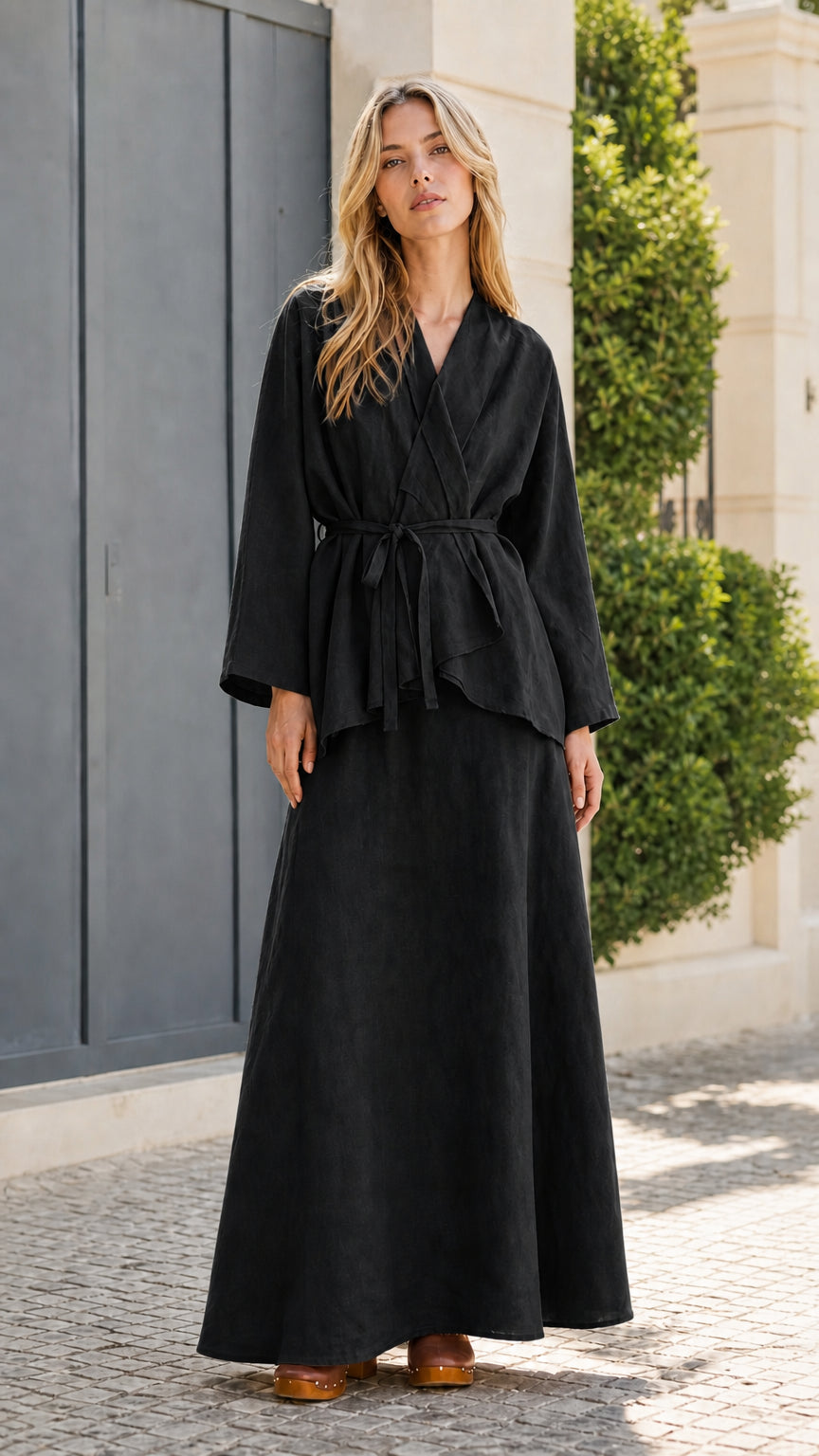Front view of model wearing black two-piece set