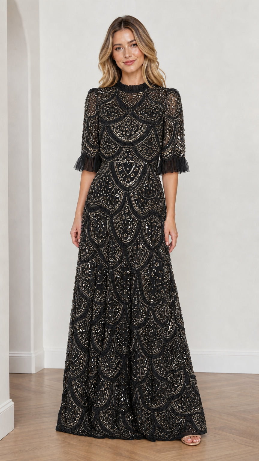 Model wearing Black embellished ruffle mock neck maxi dress, front view