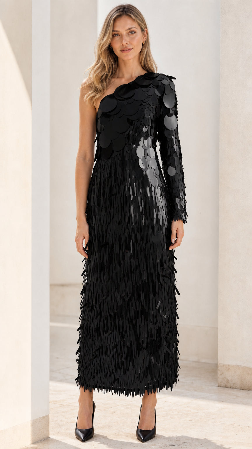 Front view of black one-shoulder sequin fringe maxi dress
