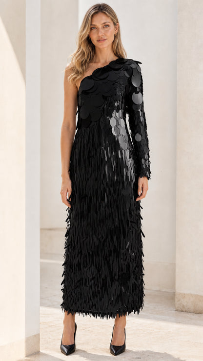 Front view of black one-shoulder sequin fringe maxi dress