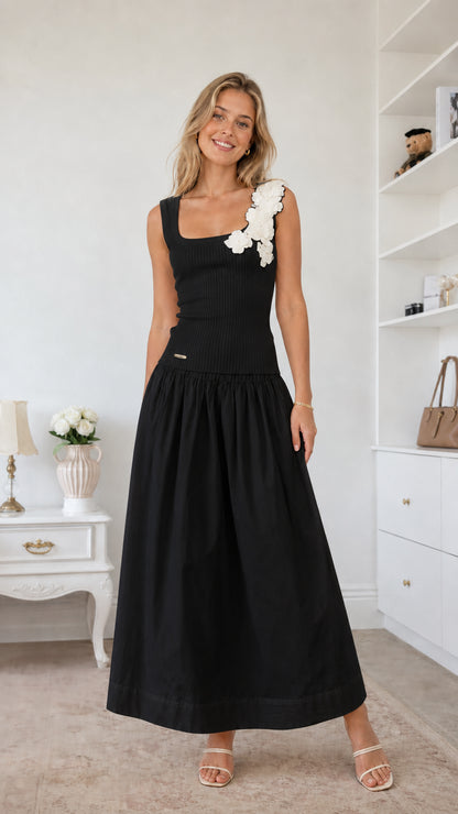 Model wearing black color variant of the floral applique midi dress