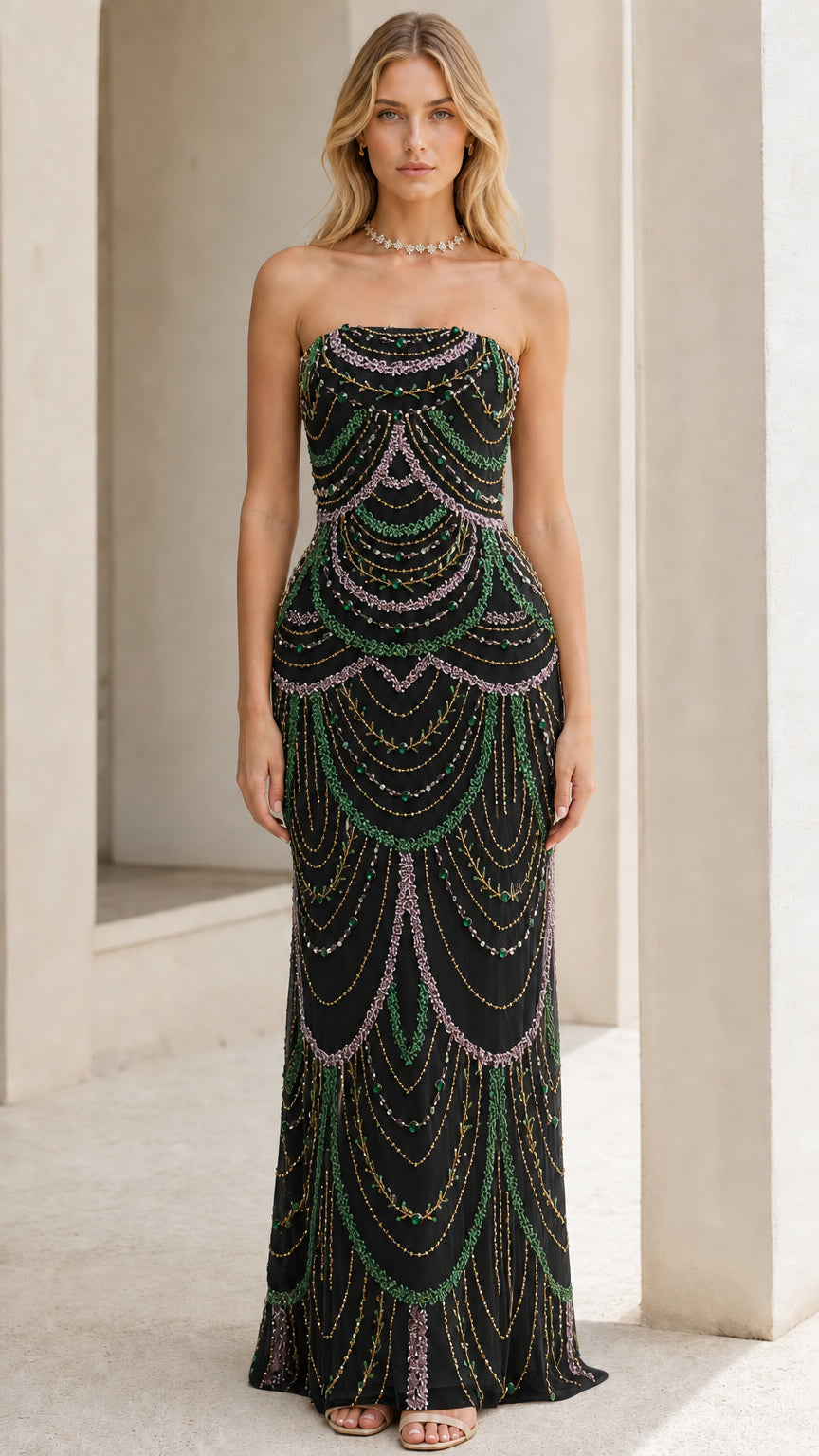 Front view of model wearing the black beaded evening gown variant