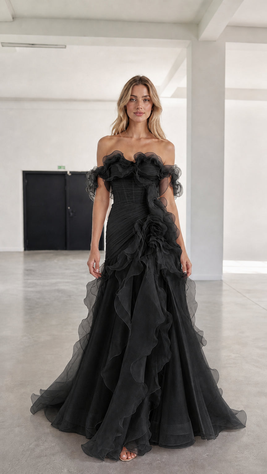 Front view of black off-shoulder ruffled tulle evening gown