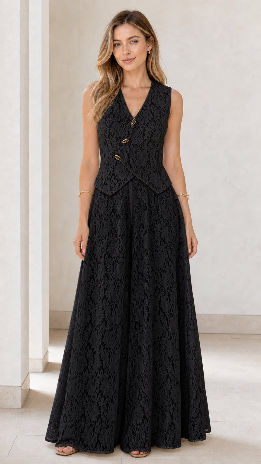 Model wearing black lace vest and wide leg jumpsuit