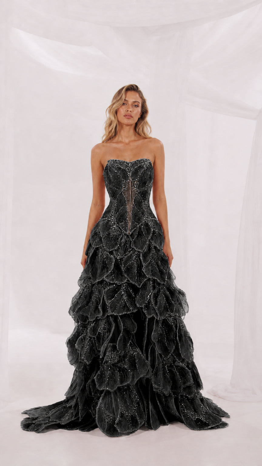 Front view of black strapless evening gown