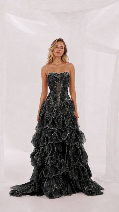 Front view of black strapless evening gown