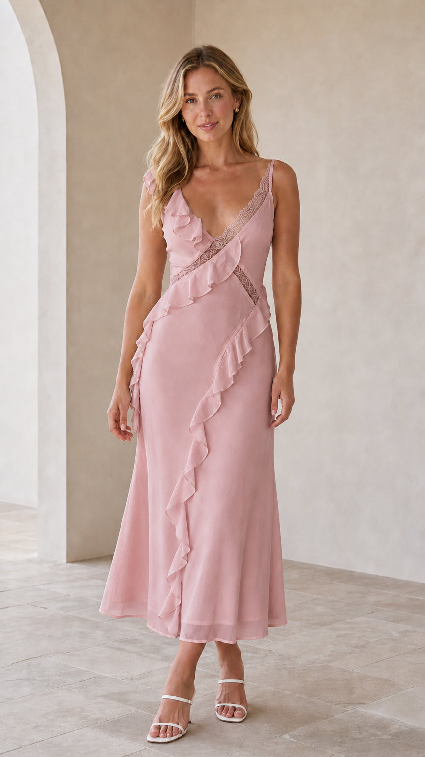 Model wearing pink ruffled lace-trim slip midi dress