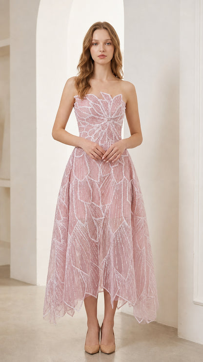 Woman wearing dusty pink strapless beaded leaf embroidery midi cocktail dress