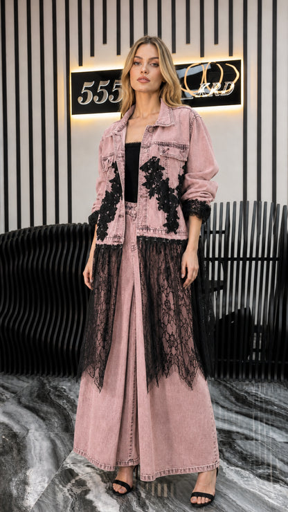 Front view of model wearing pink denim long jacket and matching pants with lace trim