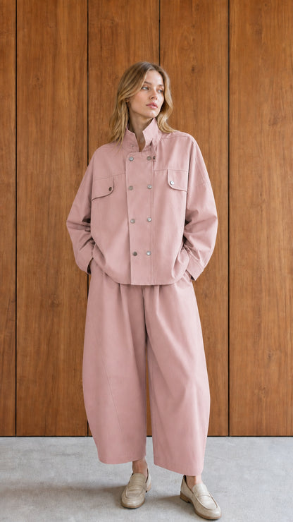 Woman wearing pink utility jacket and wide-leg pants set