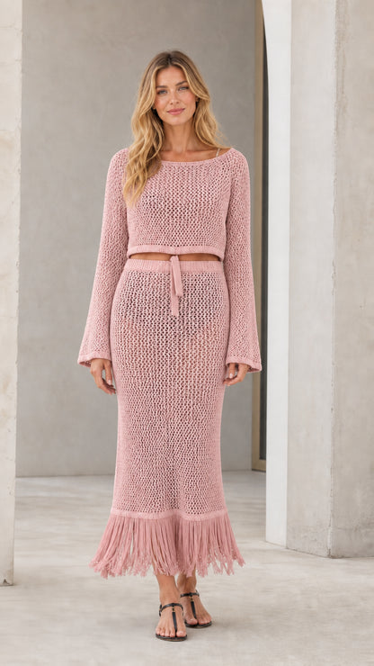 Front view of model wearing pink crochet two-piece set
