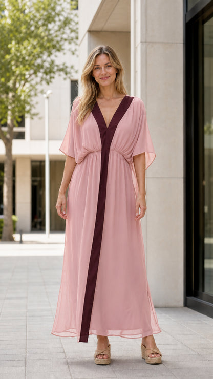 Front view of model wearing pink maxi kaftan dress