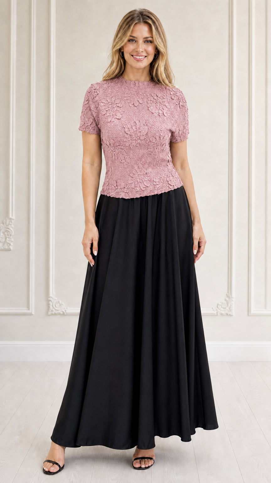 Model wearing pink textured floral bodice maxi dress