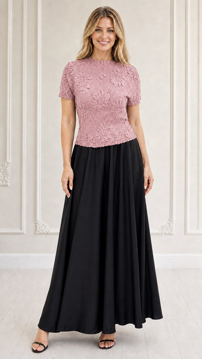 Model wearing pink textured floral bodice maxi dress