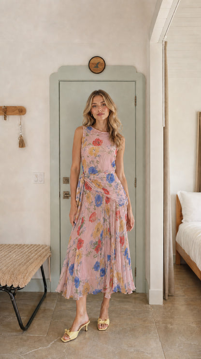 Front view of pink floral pleated midi dress