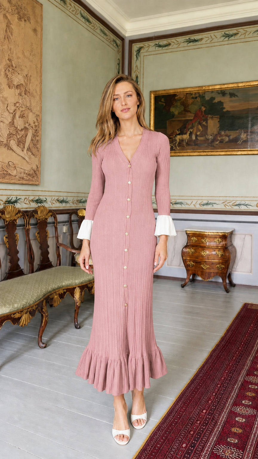 Front view of model wearing pink ribbed knit midi dress