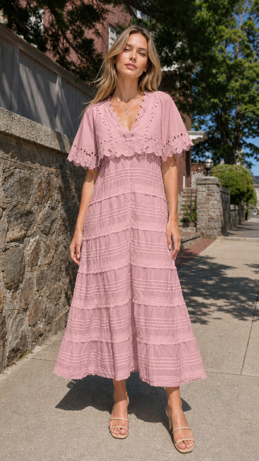 Full view of woman wearing pink eyelet lace cape sleeve maxi dress
