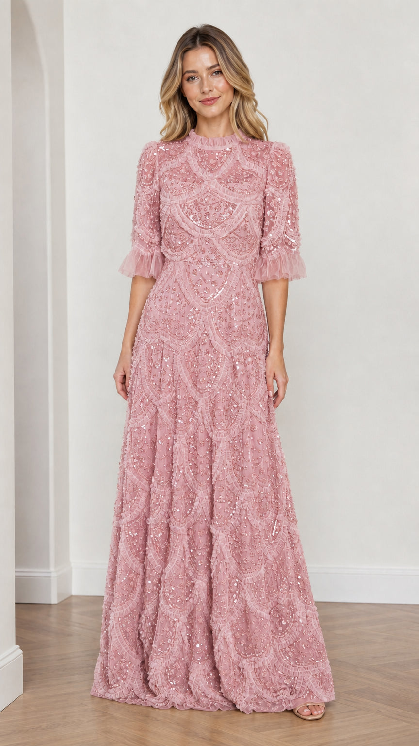 Model wearing Pink embellished ruffle mock neck maxi dress, front view