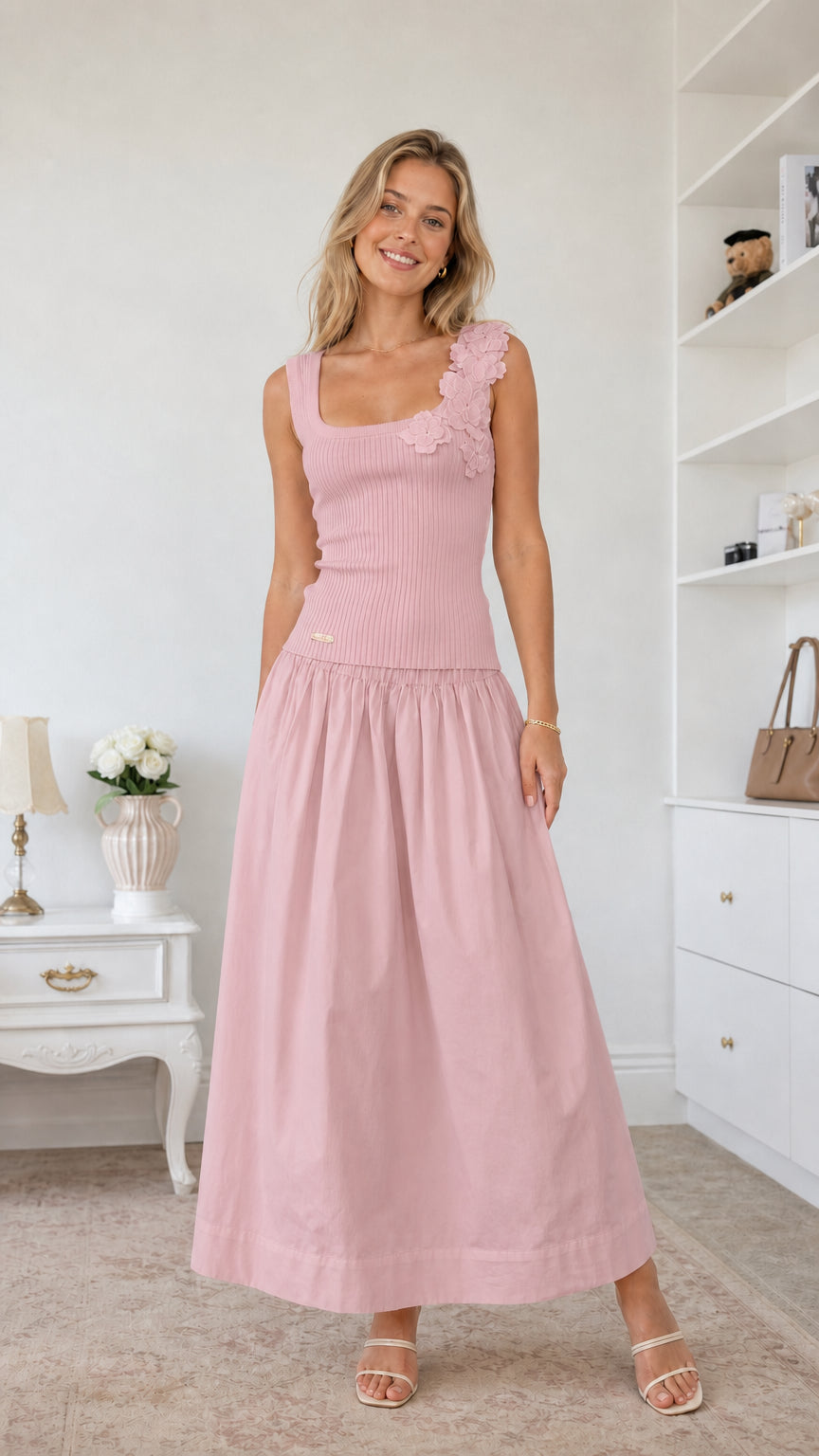 Model wearing pink color variant of the floral applique midi dress