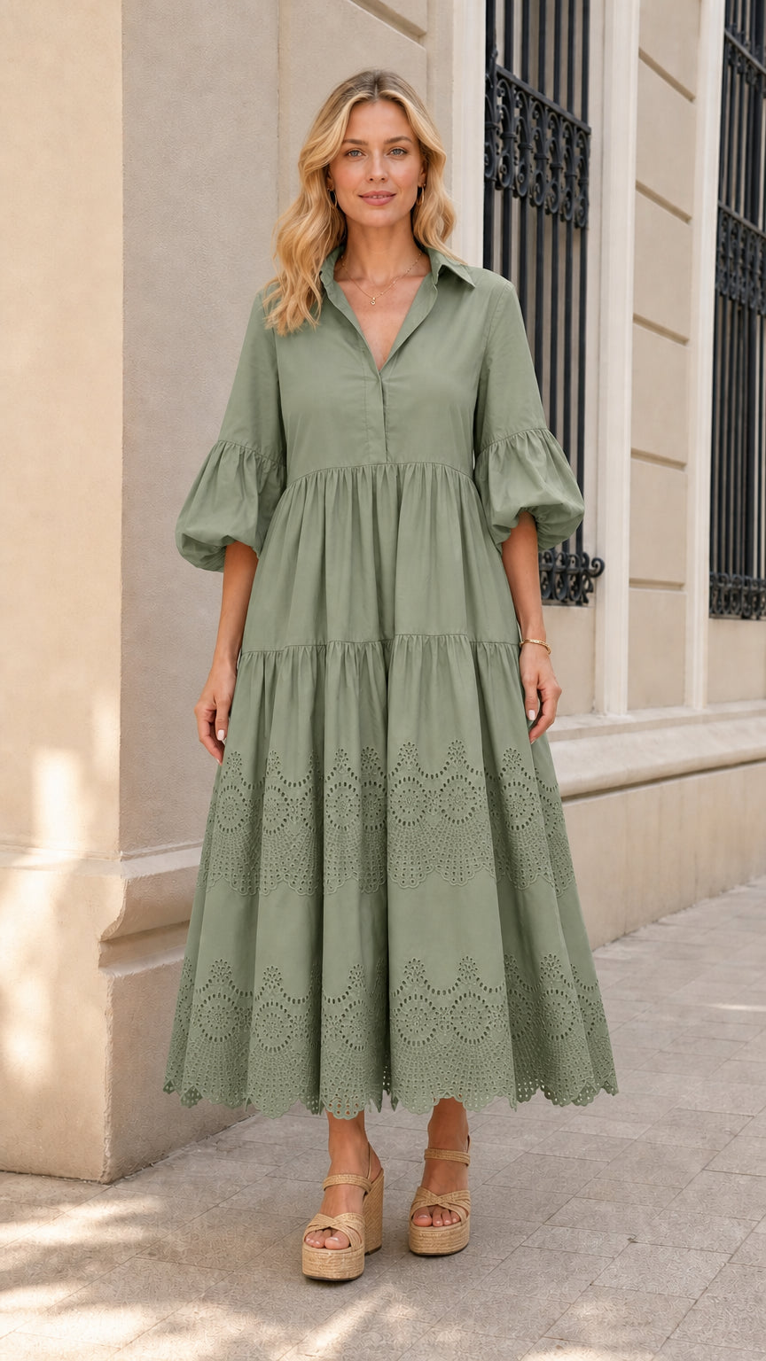 Front view of woman wearing sage green collared tiered midi dress