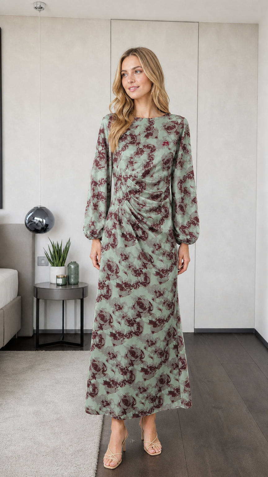 Model wearing sage green floral long sleeve maxi dress