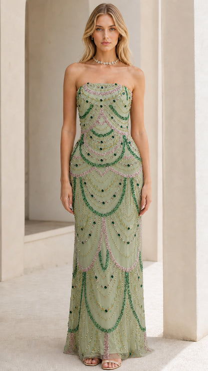 Front view of model wearing the sage green beaded evening gown variant