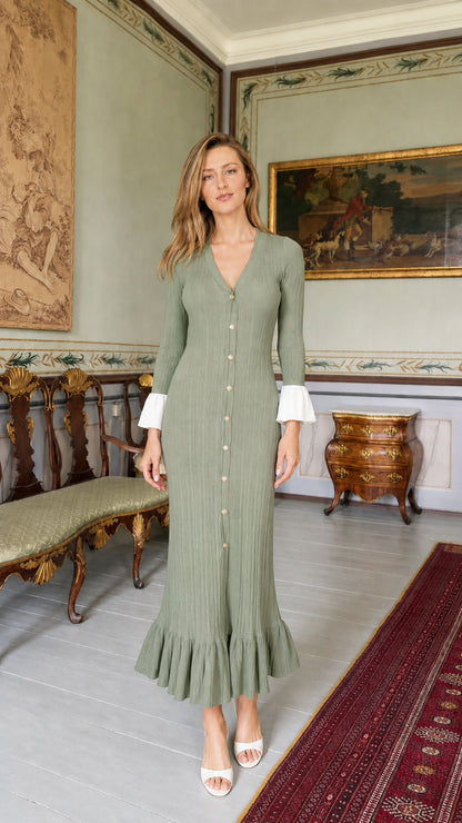 Front view of model wearing sage green ribbed knit midi dress