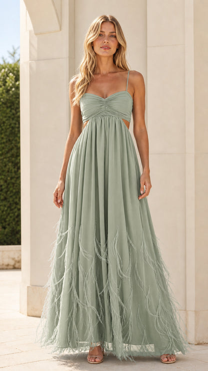 Model wearing sage green variant of the feather trim maxi dress