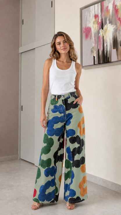 Woman wearing sage green background floral wide-leg denim jeans