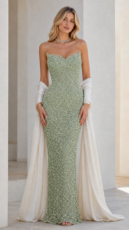 Front view of sage green beaded strapless evening dress with draped wrap