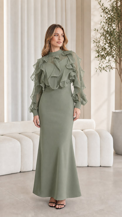 Full-length view of sage green ruffled evening maxi dress