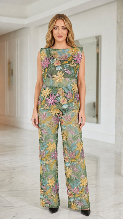 Front view of model wearing sage green sequin floral mesh two-piece set