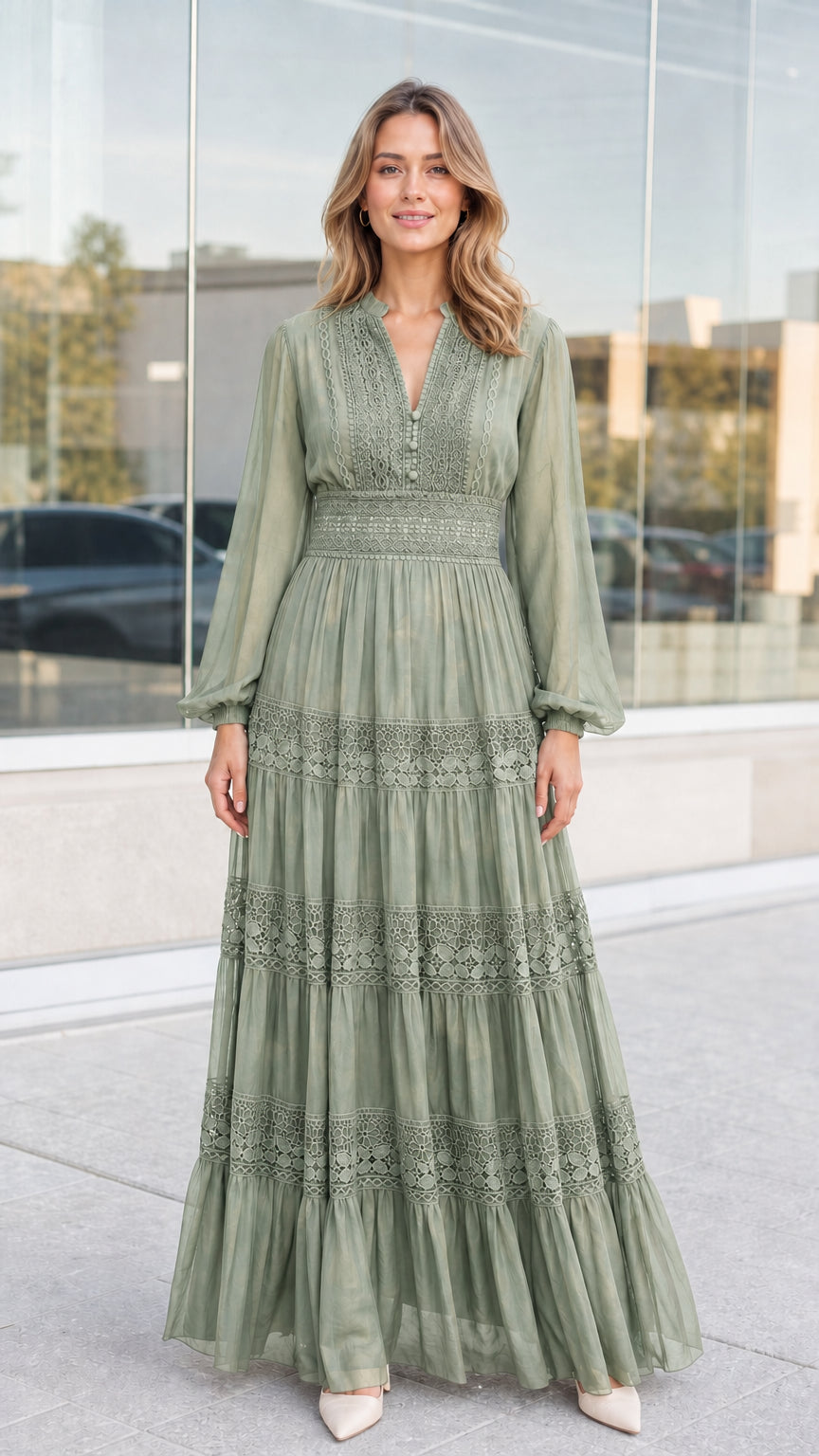 Front view of woman wearing sage green lace trim tiered maxi dress