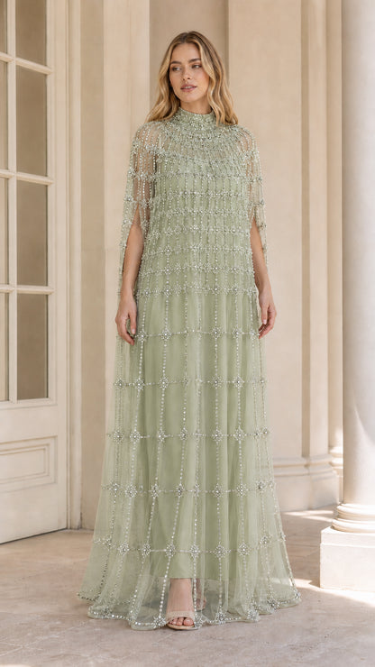 Sage green crystal embellished floor-length cape gown